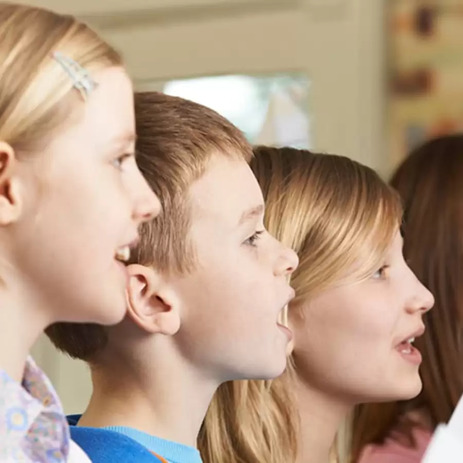 Children participating in a singing class at Epic School of Music.