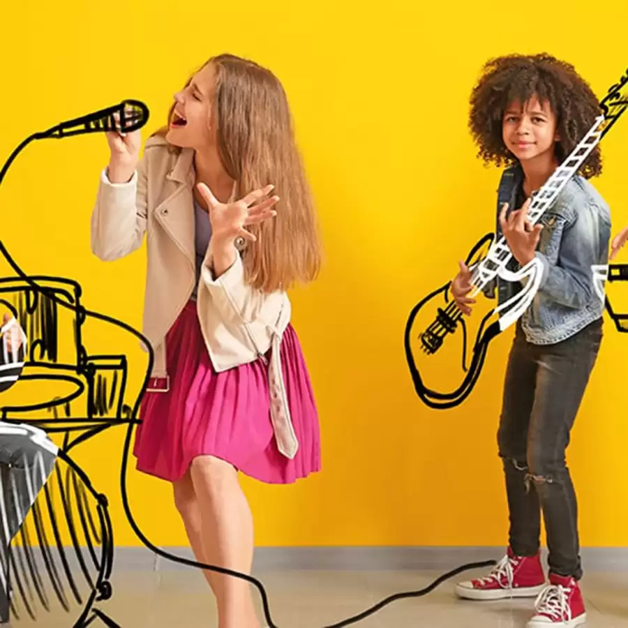 Two girls during a music lesson at Epic School of Music.